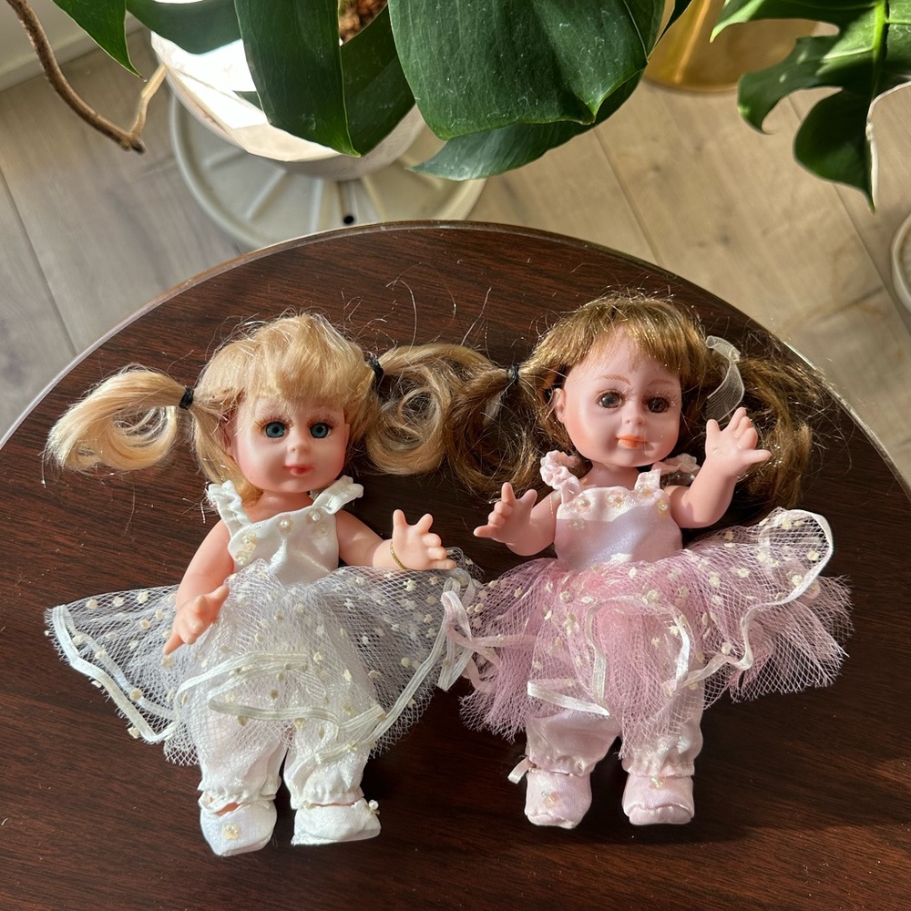 Charming Twin Dolls in Pink and White Dresses